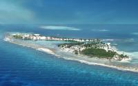 On the barrier reef of Belize lies atoll Ariel that is photographed from the air in this picture.