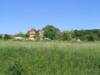 À part of the camping with on the background the Domaine de Longat