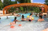 A part of the big swimming pool of Camping Le Temps Libre.