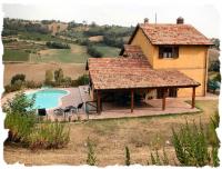 This is an overview of the house as you drive from the village.