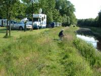 Fishing in the closeby  brook. Cast your line from your camping spot and drink a cup of coffee with a partner.