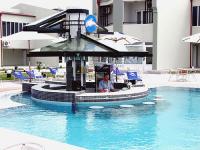 The bar and pool at the Hotel Delfin.