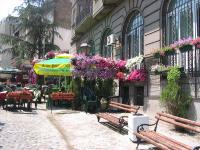 A cozy corner with a restaurant in the summer in Skadarlija.